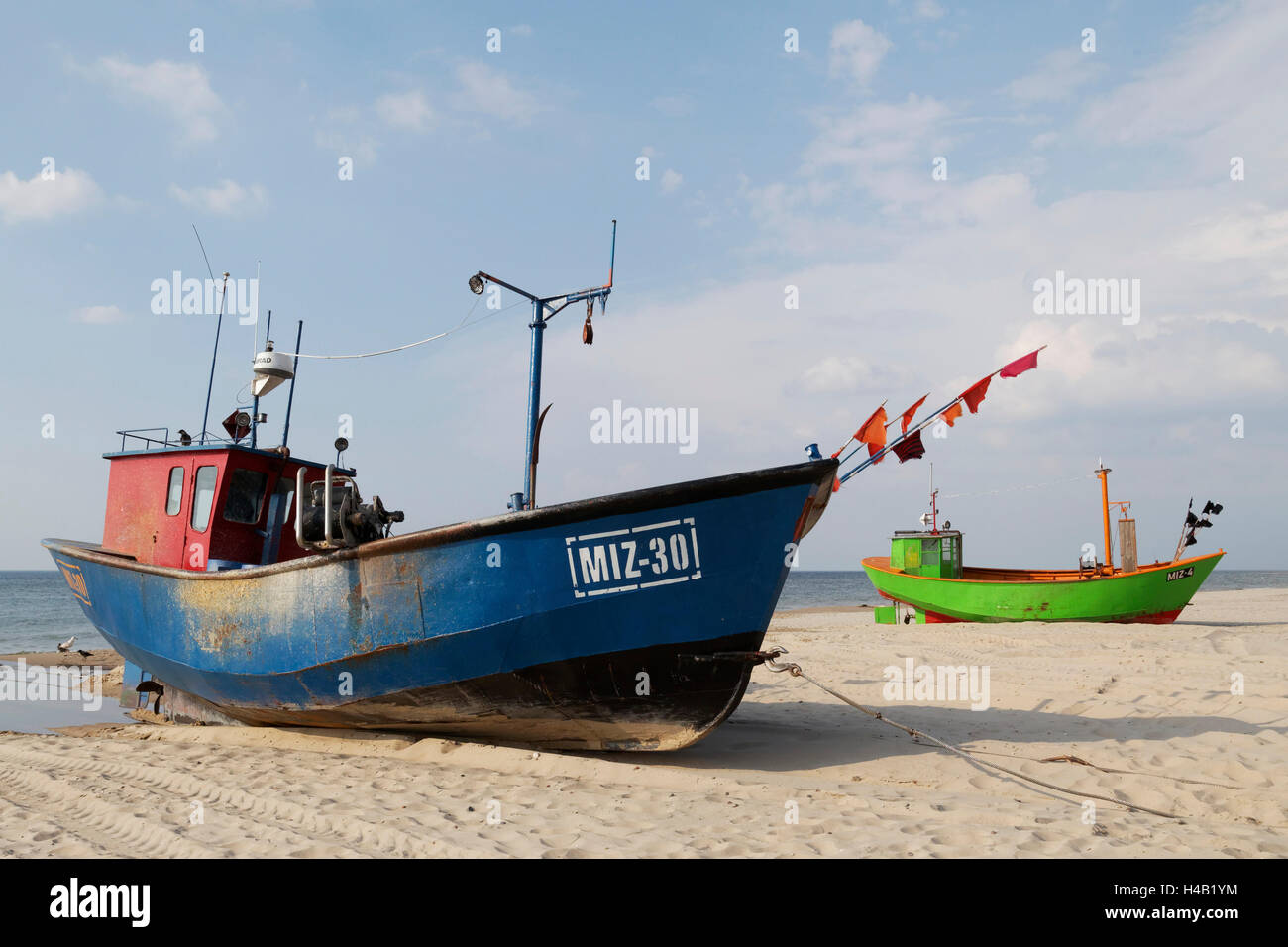 Fishing boats on the beach of the Baltic Sea near Misdroy in the national park Wollin in the West Pomeranian Voivodeship, Poland Stock Photo