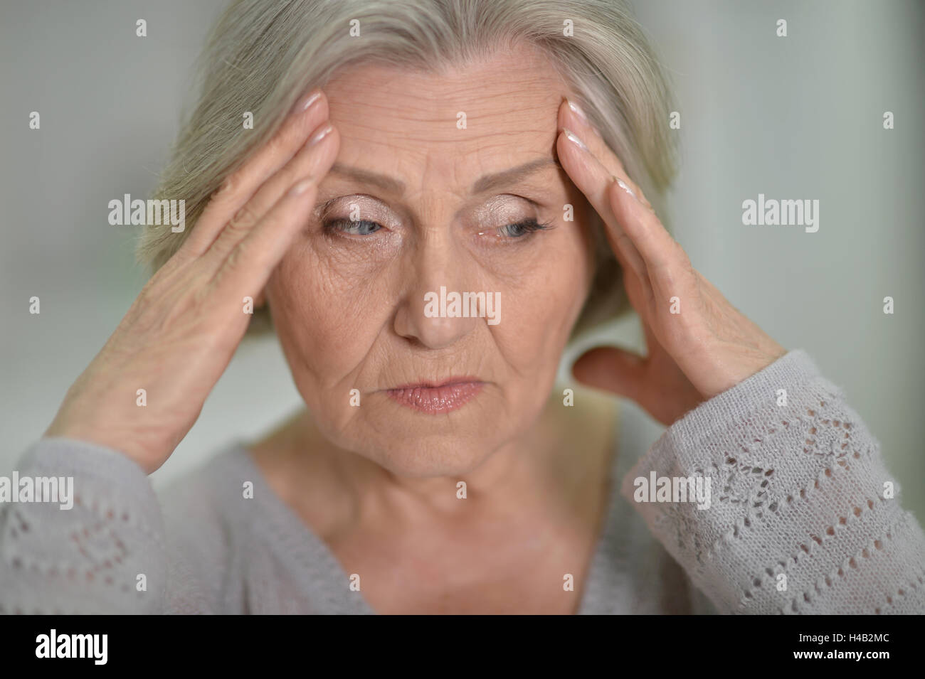 melancholy Senior woman Stock Photo Alamy
