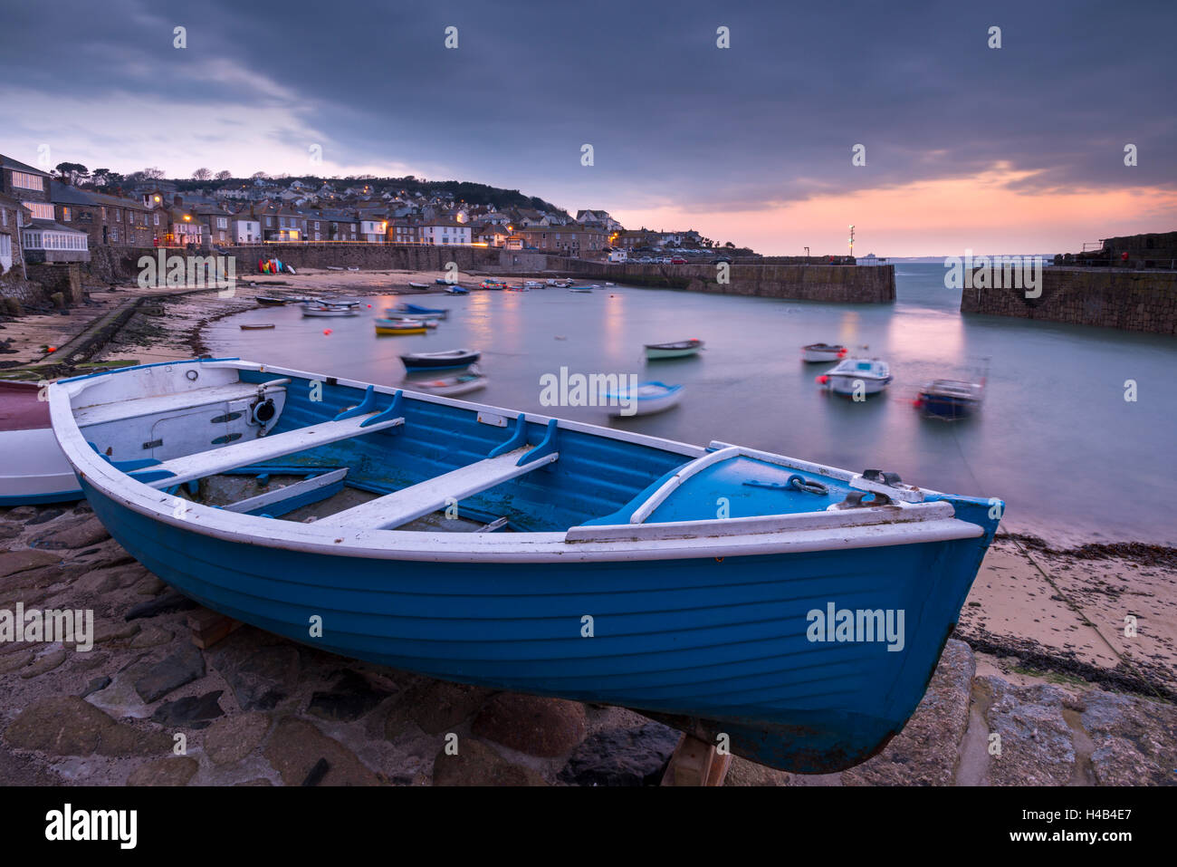 Mousehole harbour at dawn, Mousehole, Cornwall, England. Stock Photo