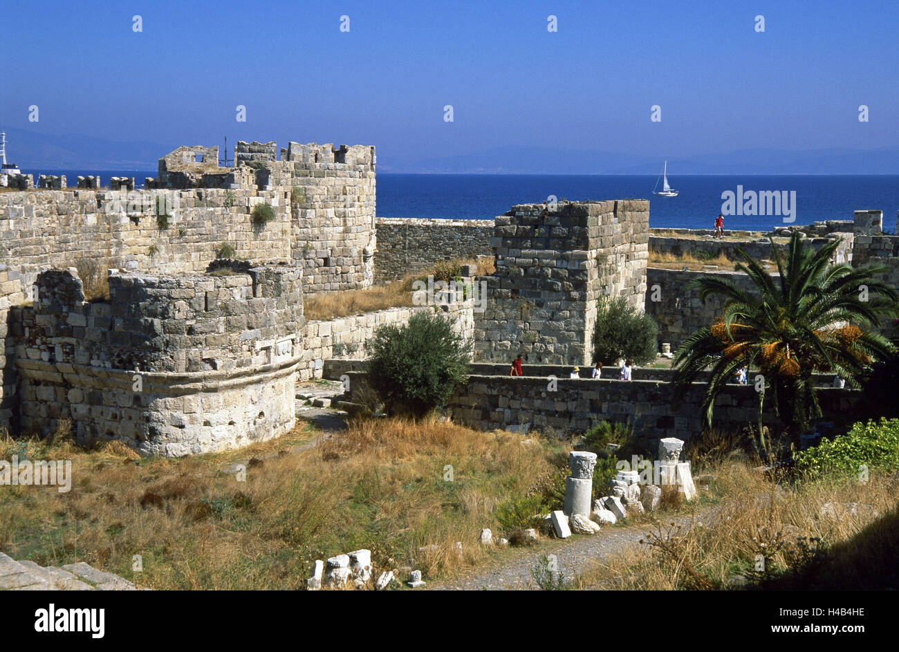 Greece, Dodekanes, island Fondling, Kos town, fort Neratzia, visitor, sea, island group, Mediterranean island, the Aegean Sea, town, port, Maltese Knight's fort, Maltese Knight's fortress, fortress area, structure, historically, harbour fort, fortress, Kastro, fortress ruin, fortress defensive walls, towers, defensive walls, people, place of interest, Stock Photo