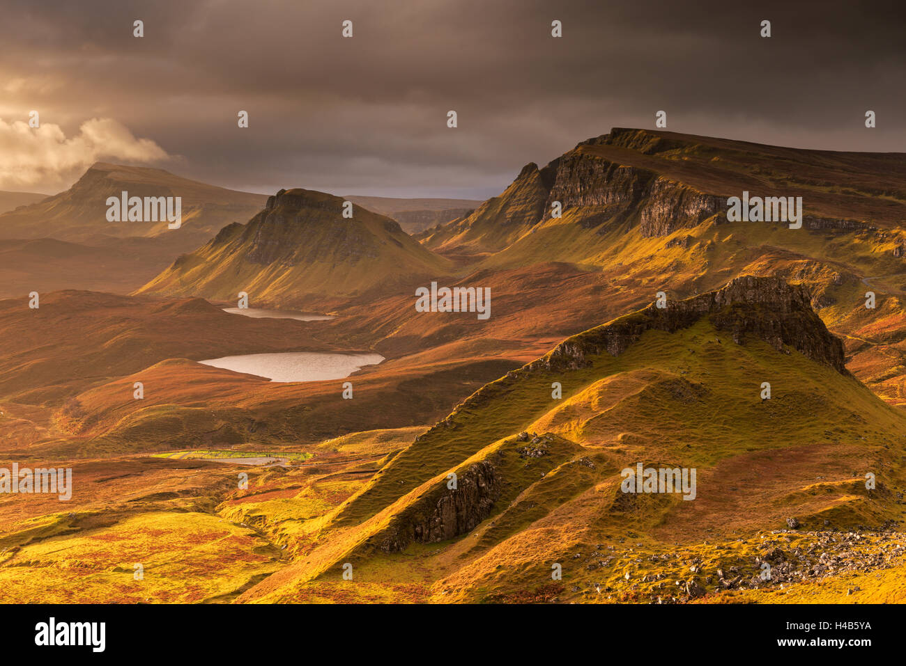 Dramatic light over the Trotternish mountain ridge from the Quiraing, Isle of Skye, Scotland. Stock Photo
