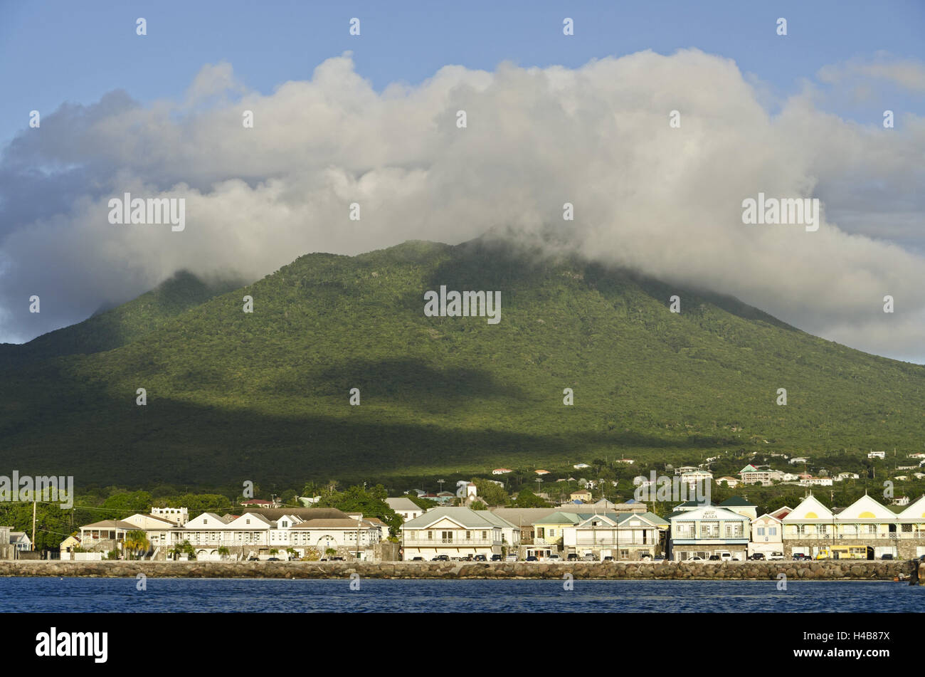 Nevis, Charlestown, houses and volcano summits 'Nevis Peak', Stock Photo