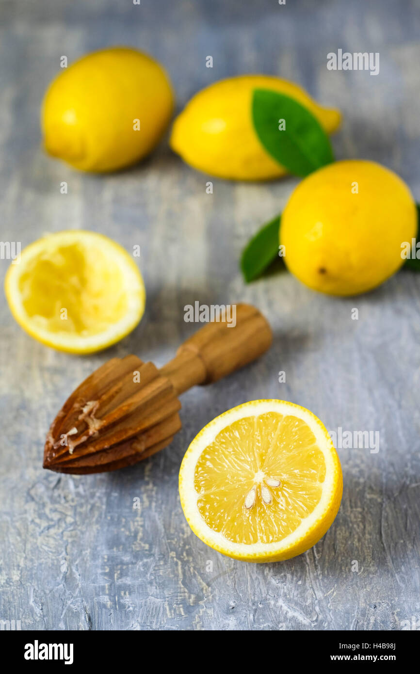 Lemons and lemon squeezer Stock Photo Alamy