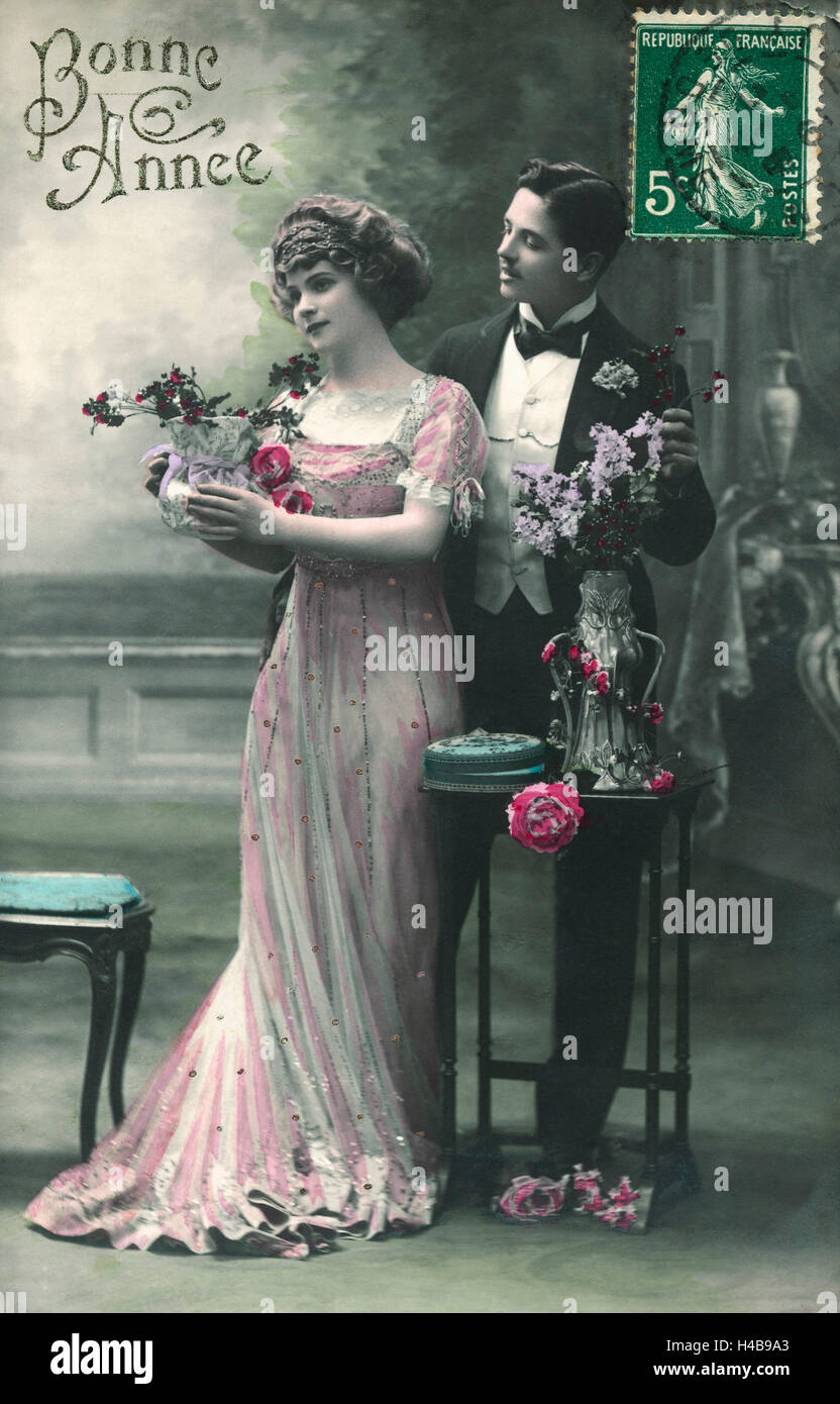 Postcard, historical, couple, bouquet, happily, in love, New Year wishes, Bonne Année Stock Photo