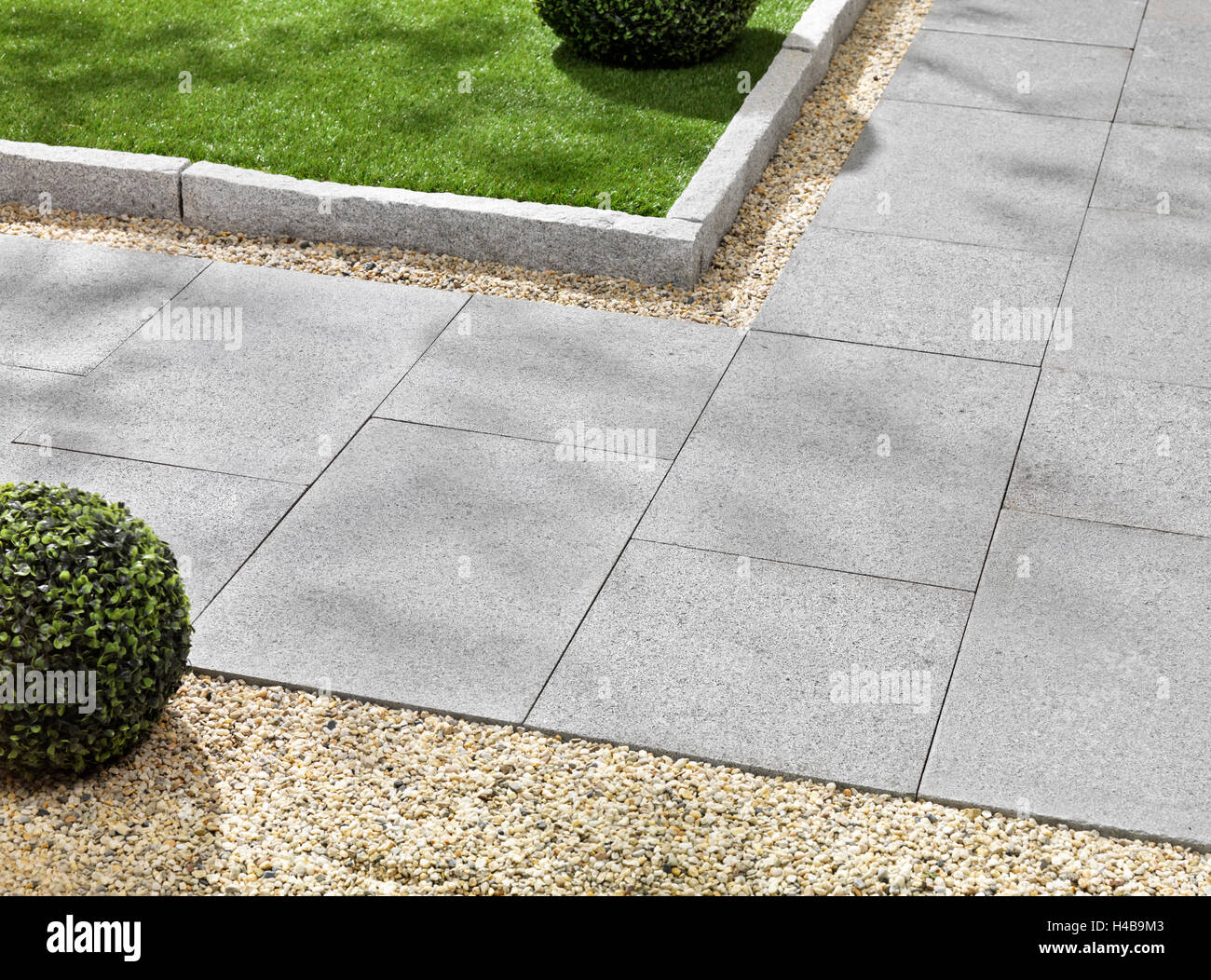 Garden, sidewalk, granite plate for garden, lawn edges Stock Photo