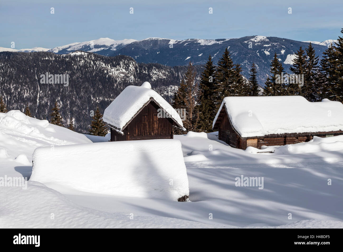 Snow-covered hut in the Alps Stock Photo - Alamy
