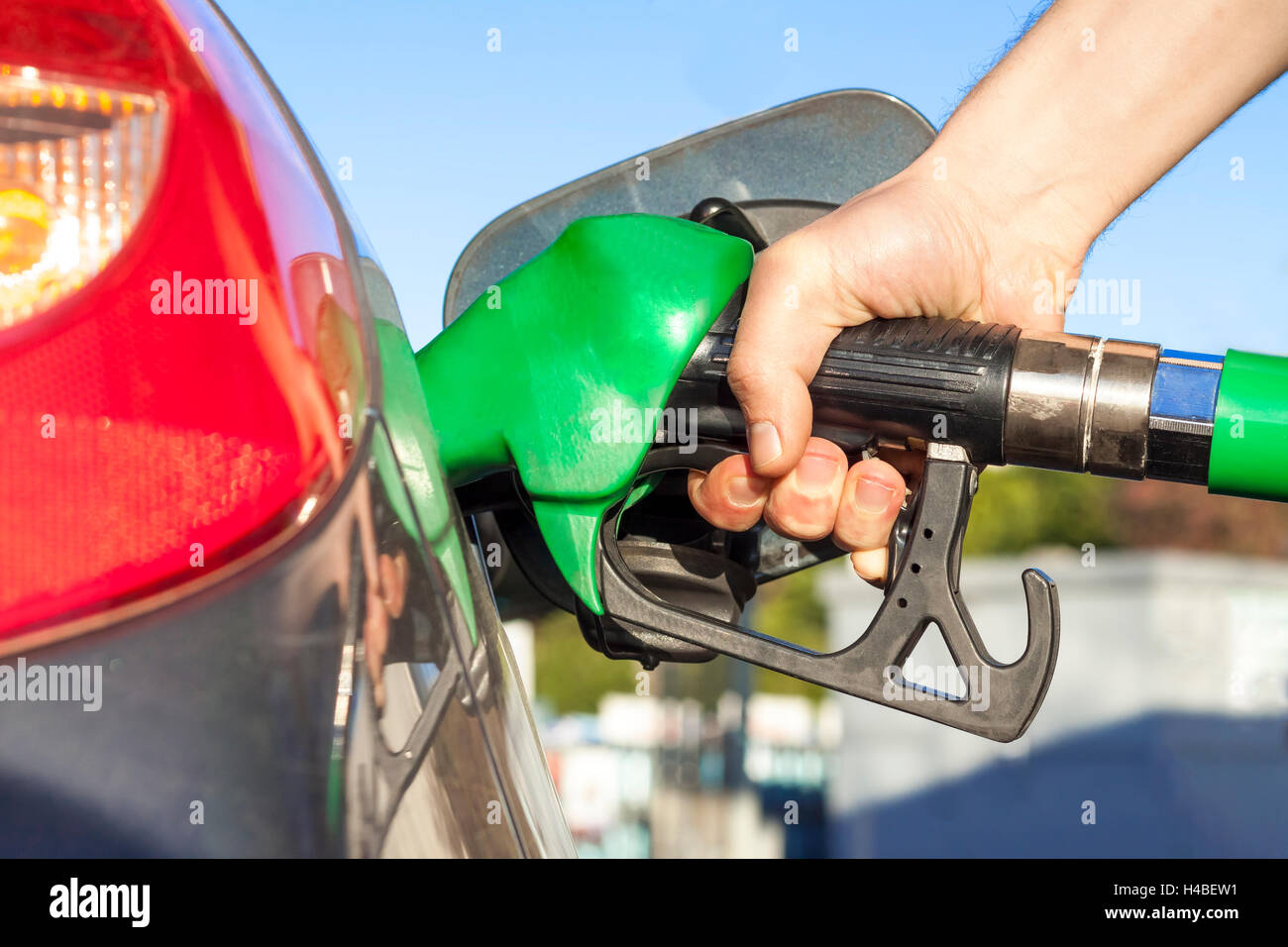 Refueling car tank with oil or gas Stock Photo