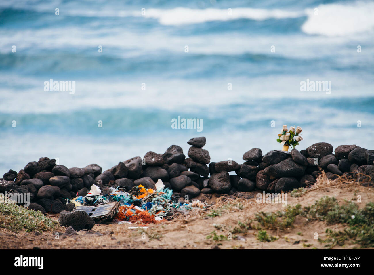 Flowers for the deceased on the sea Stock Photo