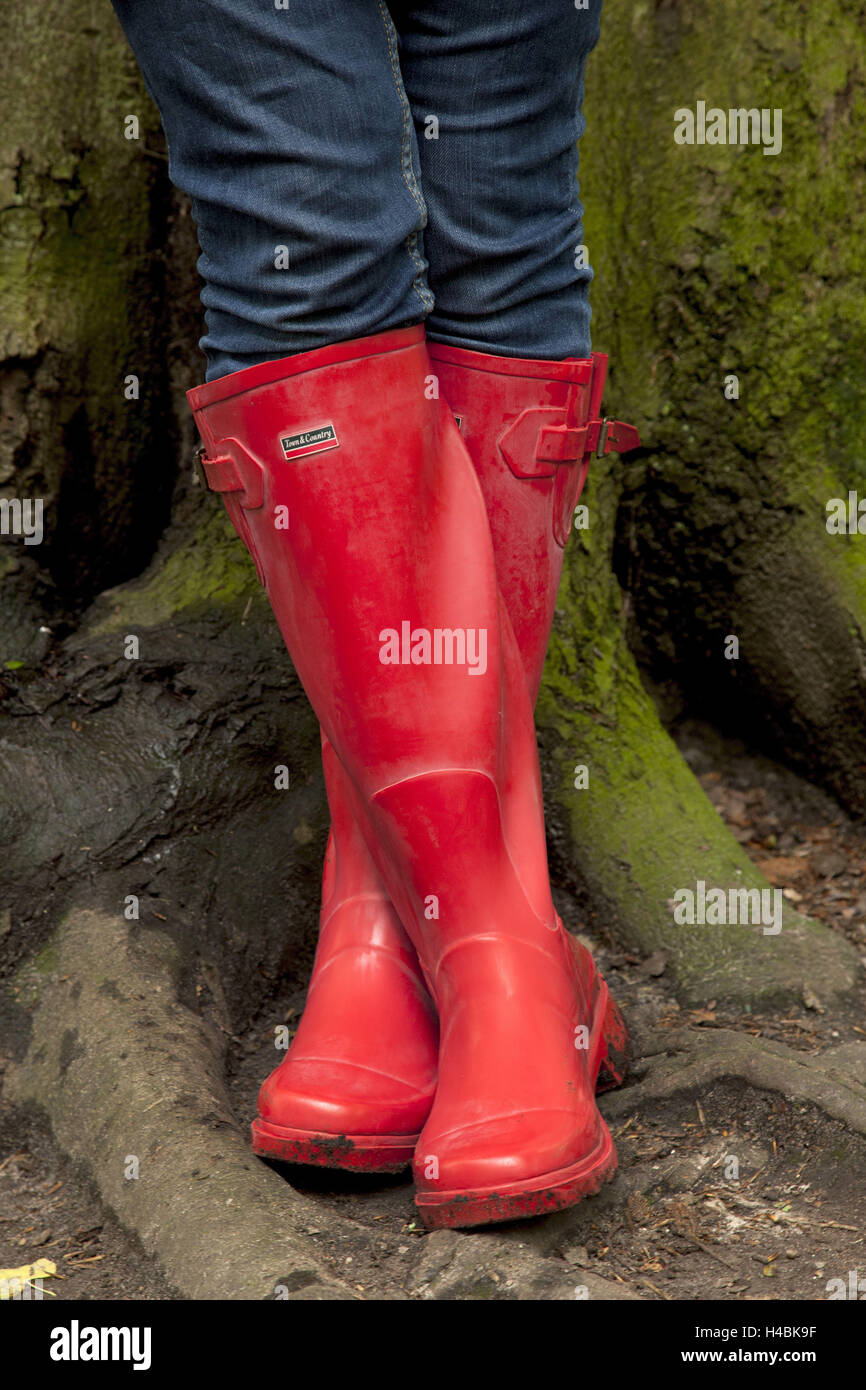 Woman, trunk, stand, detail, legs, jeans, rubber boots, red, Stock Photo