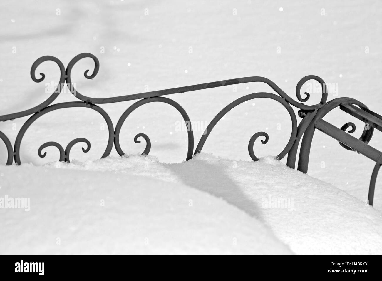Garden bench in snow Stock Photo