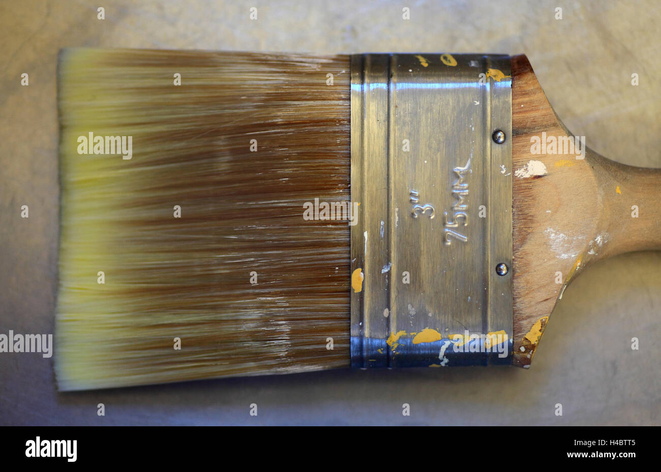Paint brush in a metal sink Stock Photo Alamy