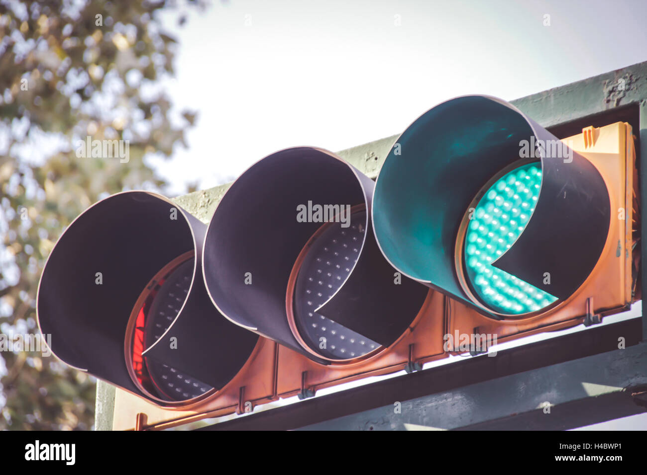Photograph of a traffic light on urban scenario Stock Photo
