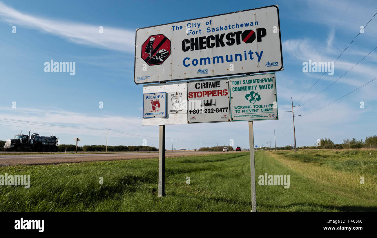 Community crime watch warning signs, Alberta Highway 15, Fort Saskatchewan, Alberta, Canada. Stock Photo