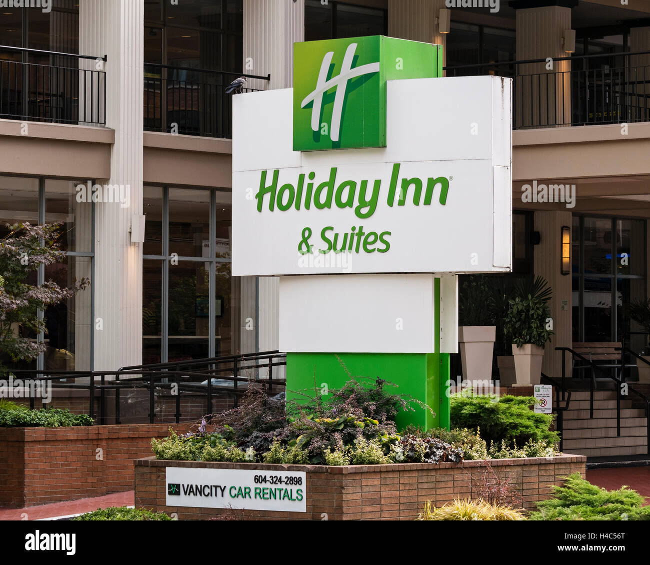 outside sign Holiday Inn & Suites downtown Vancouver Canada location Stock Photo