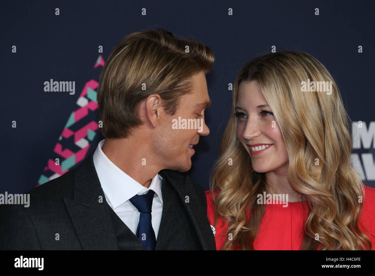Chad Michael Murray walks Sarah Roemer on the red carpet at the CMT Music Awards at Bridgestone Arena on June 8th, 2016 in Nashville, TN. Stock Photo