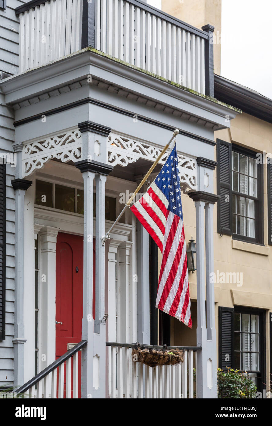 American flag front of house hi-res stock photography and images - Alamy