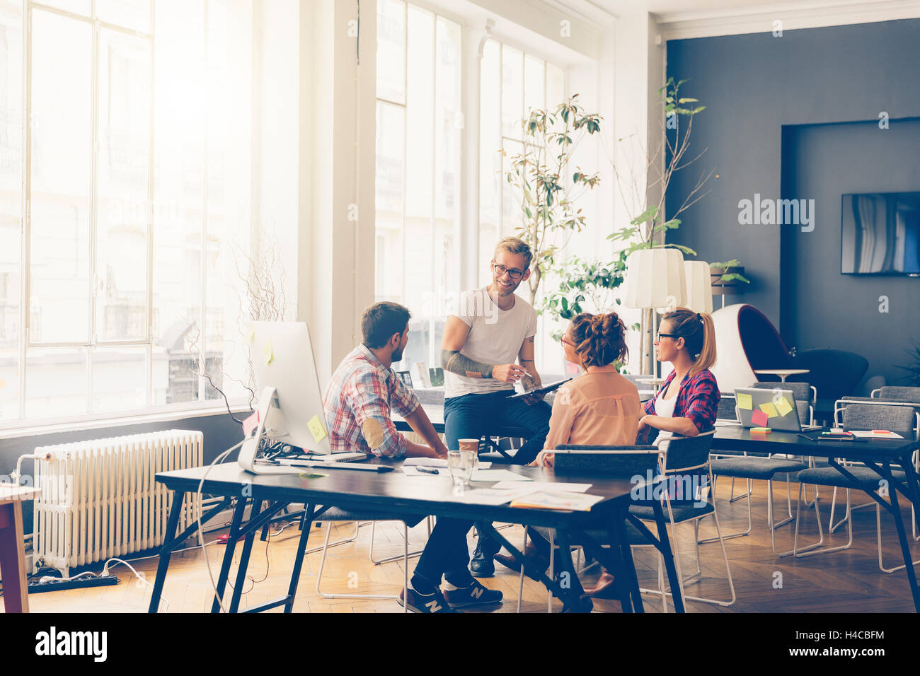 Young business people working at office on new project Stock Photo