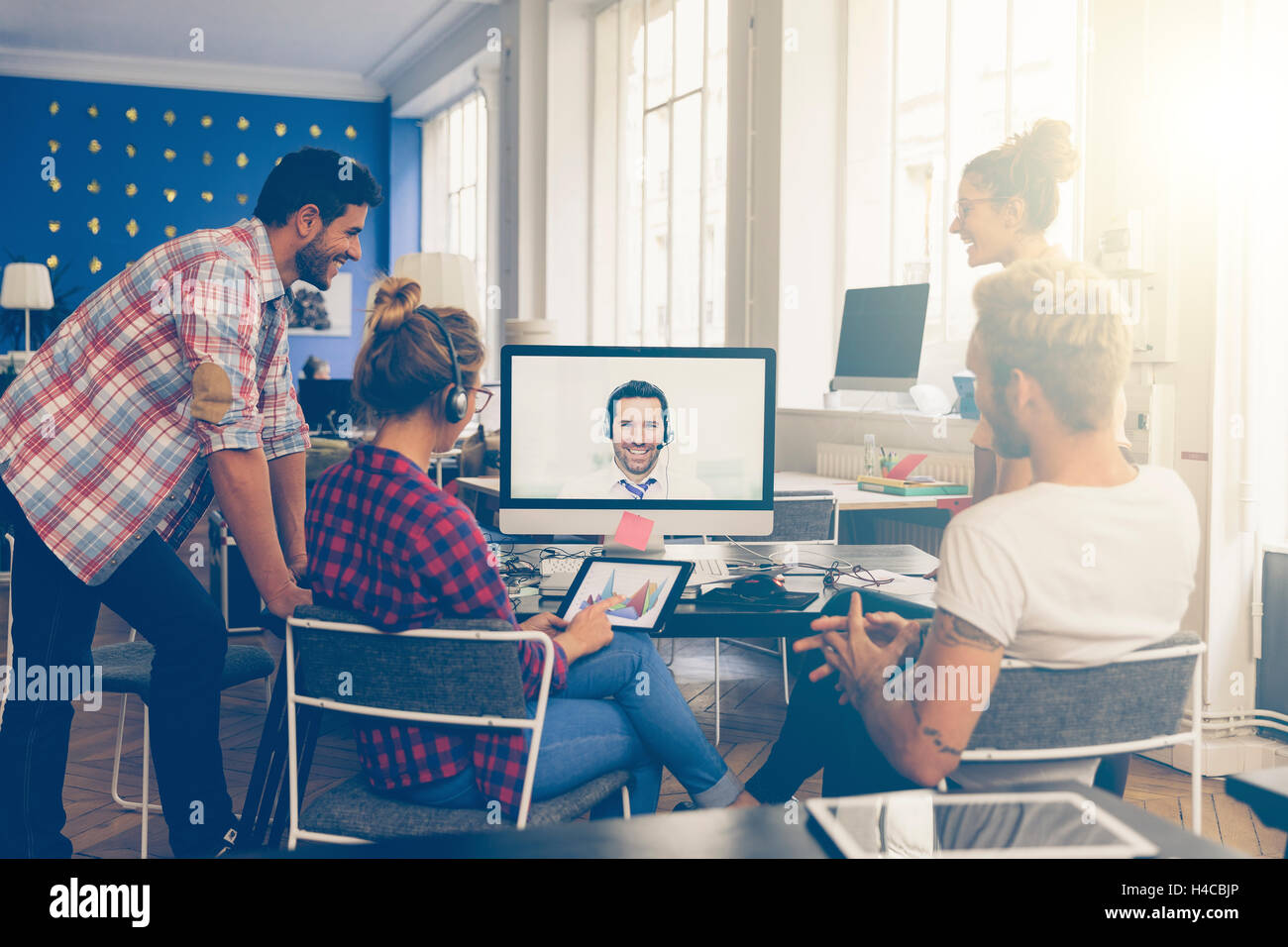 Coworkers doing a video conference in the conference room Stock Photo