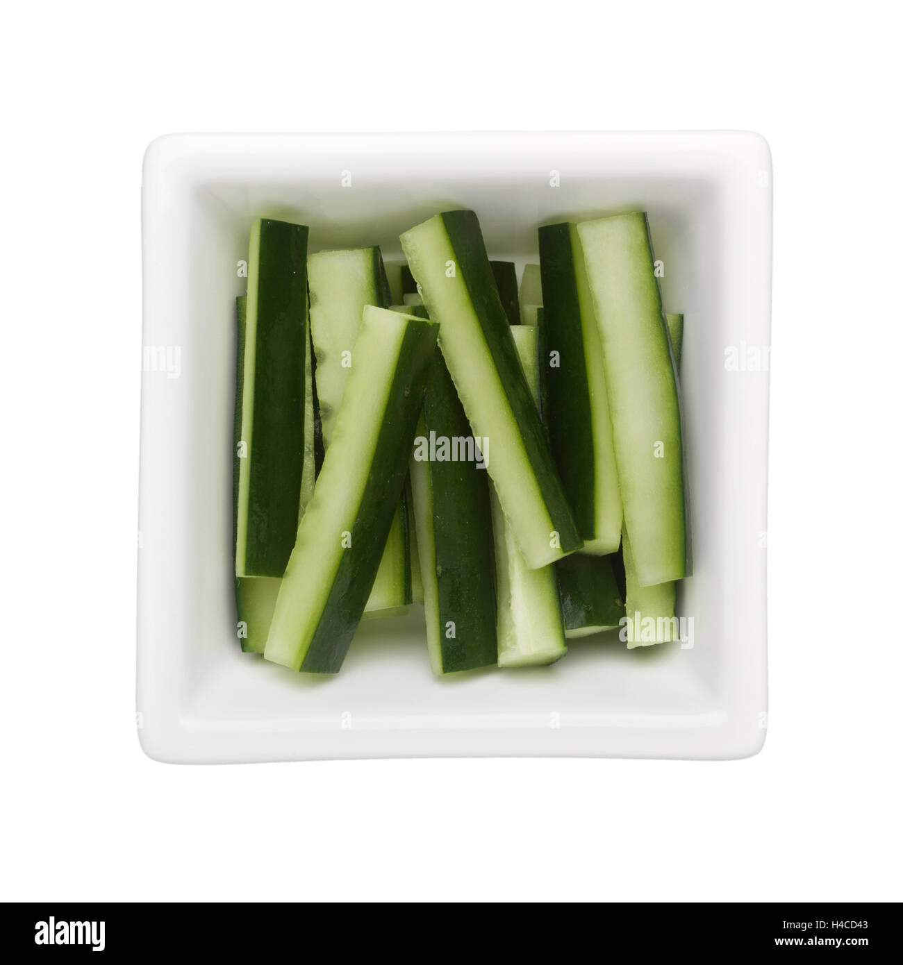 Japanese cucumber sticks in a square bowl isolated on white background Stock Photo Alamy