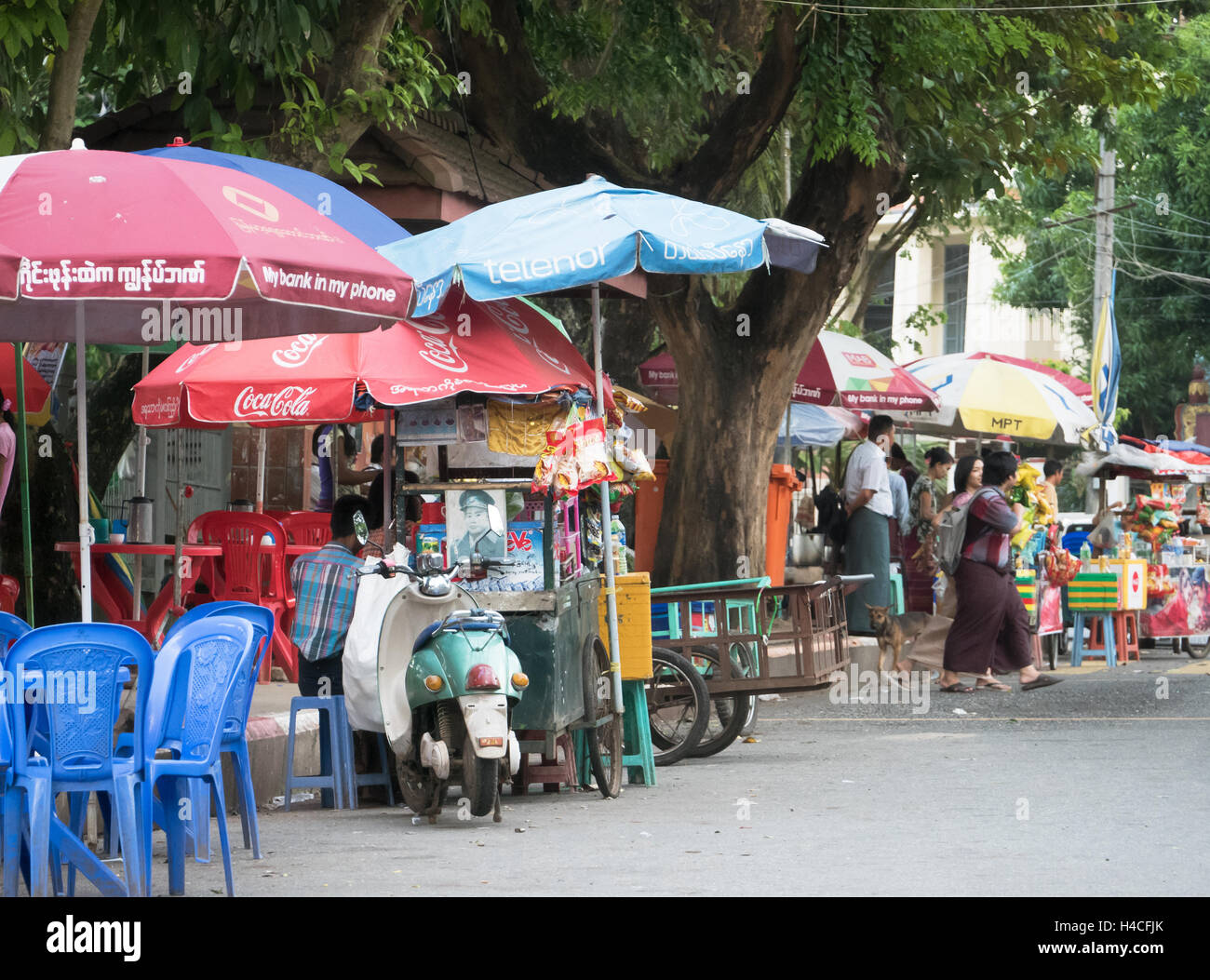 Roadside food stalls near the Shwedagon Pagoda in Yangon, Myanmar. Stock Photo