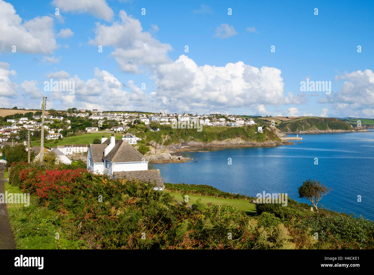 View of Cornwall coast UK from South West Coast Path towards Chapel Point, Portmellon village looking back towards Mevagissey Stock Photo