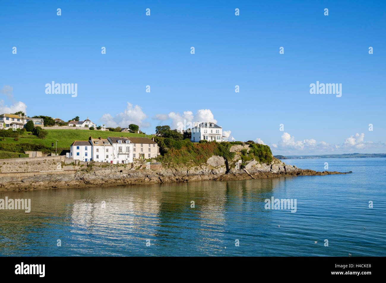 Coastal homes built on rocks overlooking the sea at Portmellon, Cornwall, England, UK Stock Photo