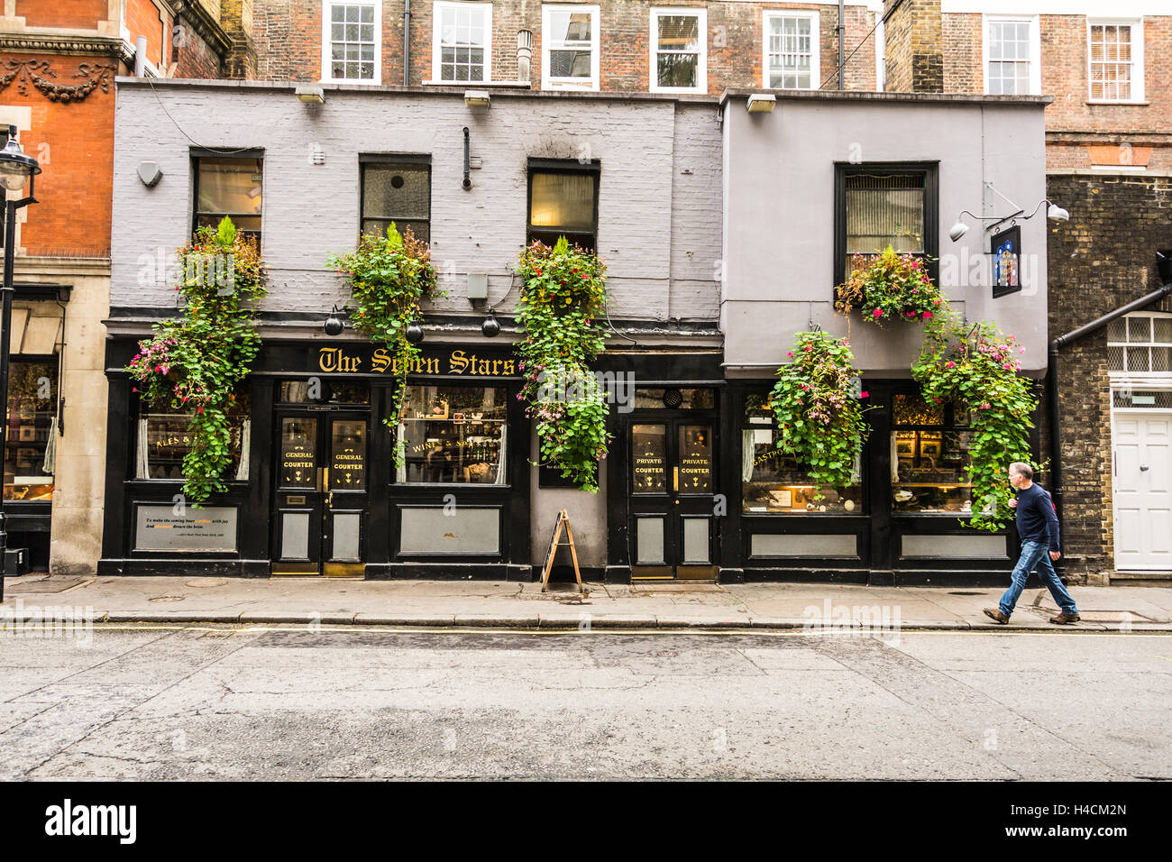 Exterior view of the Seven Stars public house on Carey Street, behind