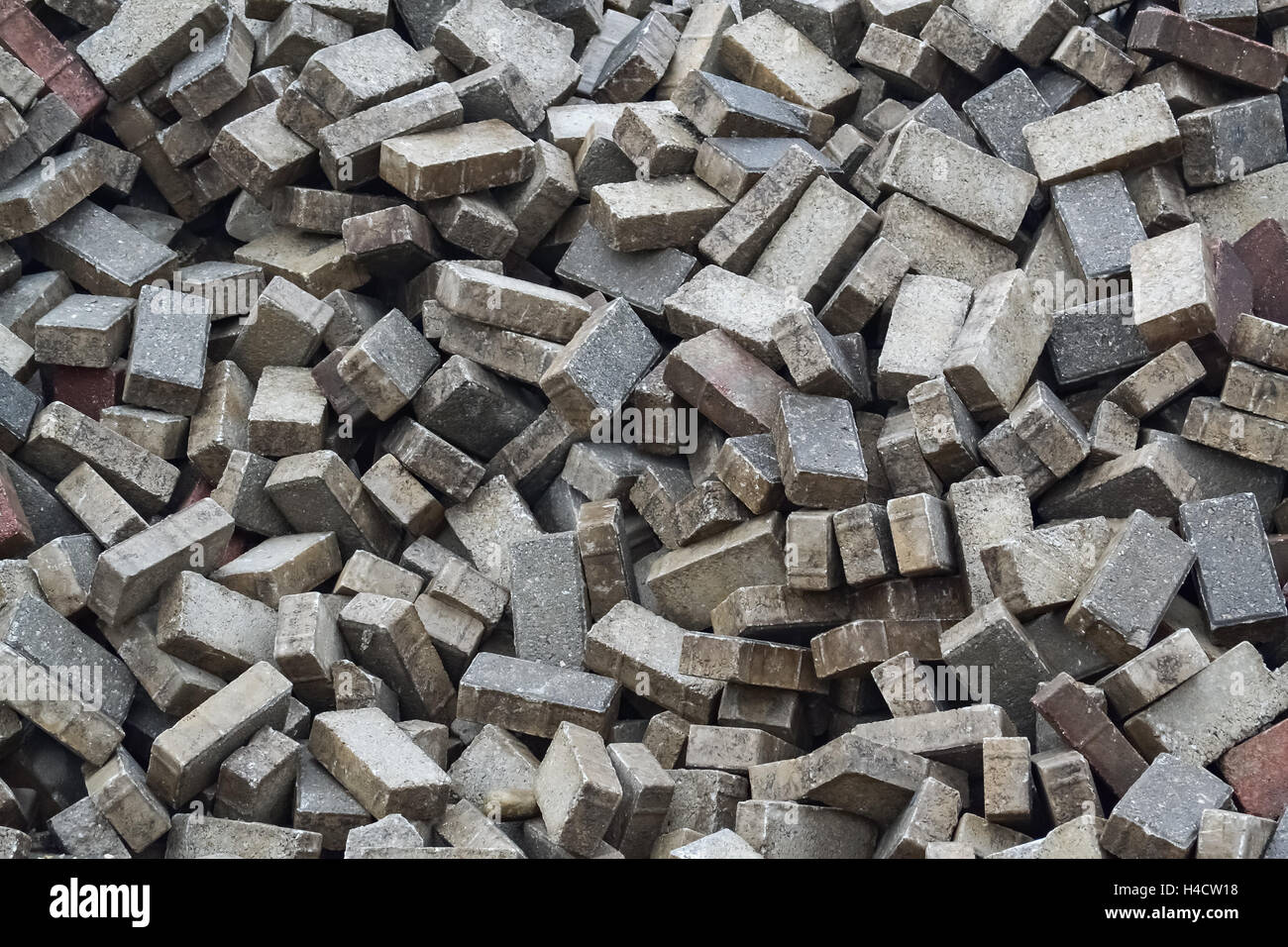 Closeup of a pile of unsorted paving blocks during the reconstruction Stock Photo