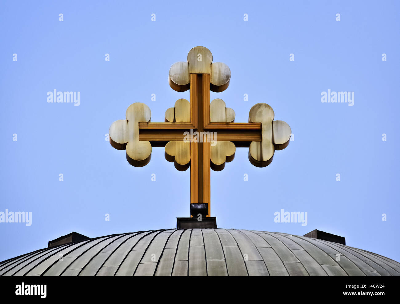 Closeup of a Christian cross on the roof of an orthodox church in
