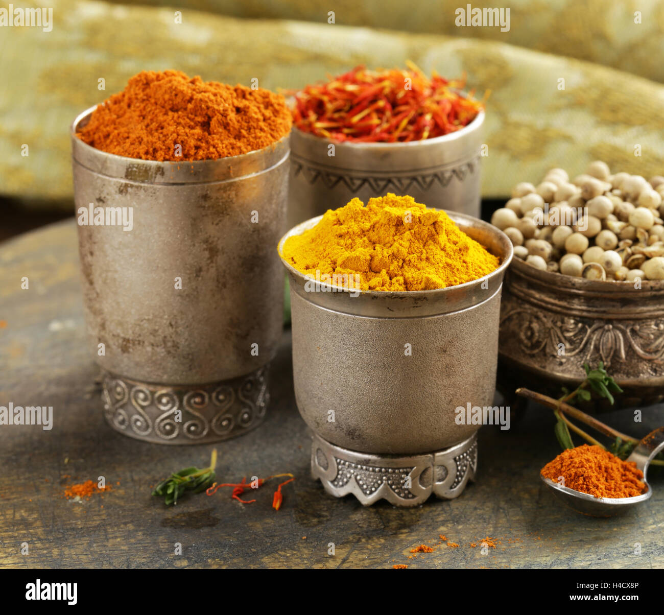 Assorted spices (saffron, pepper, turmeric, cinnamon Stock Photo Alamy