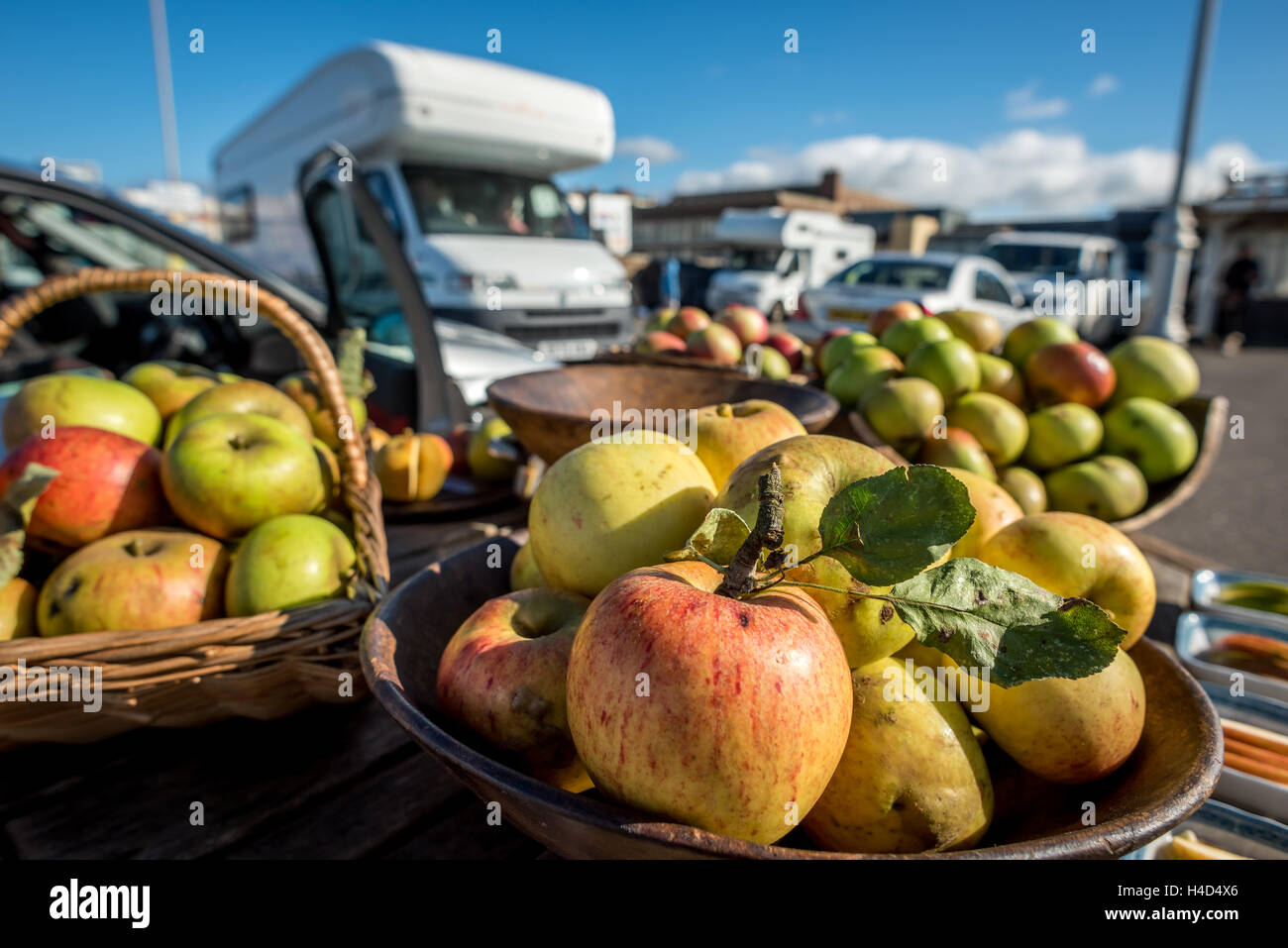 A man selling apples on Brighton seafront Stock Photo Alamy
