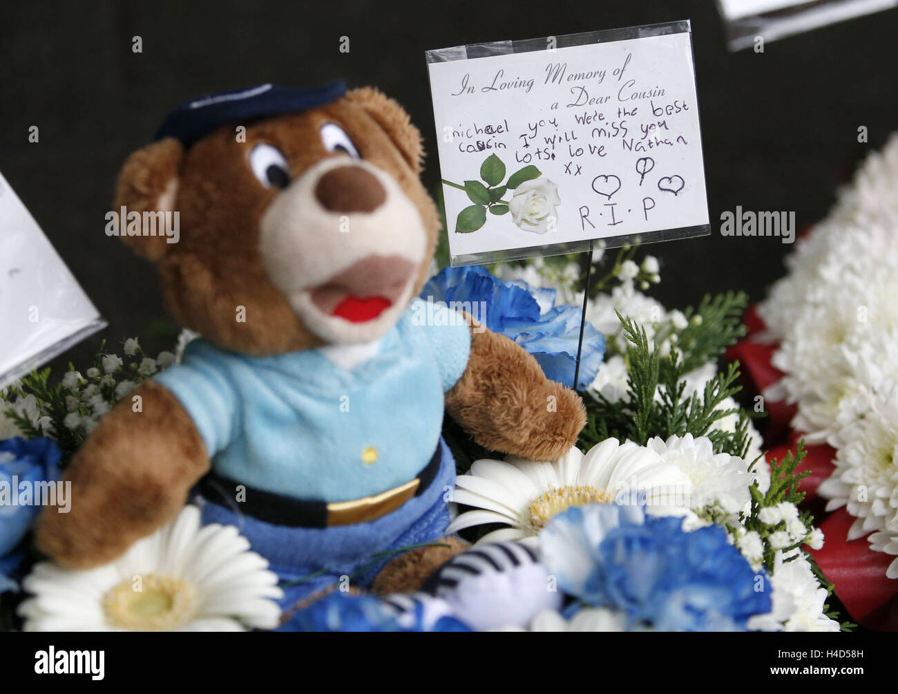 Floral tributes at the funeral of boxer Mike Towell at St Andrew's Cathedral, Dundee. Stock Photo