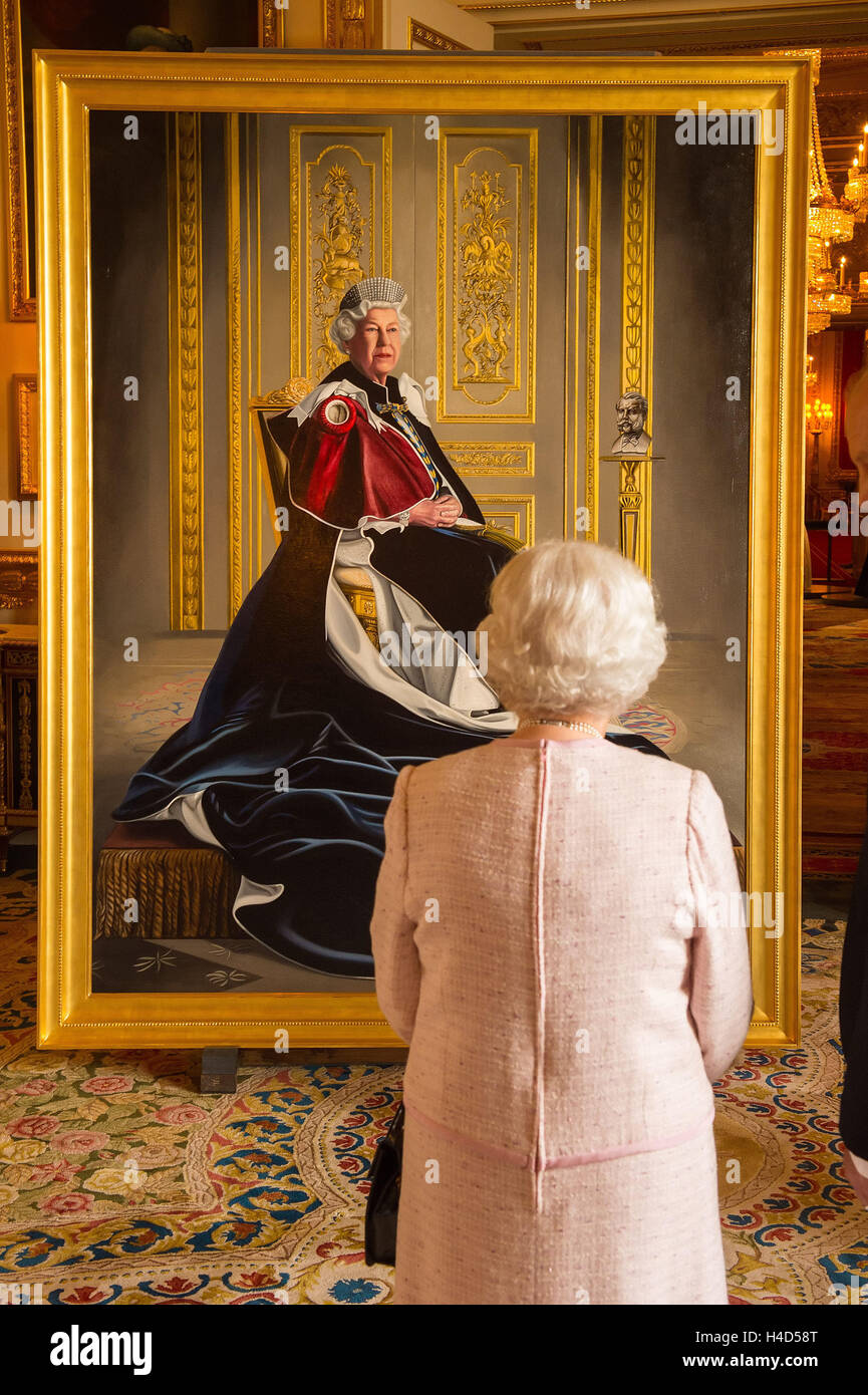 Queen Elizabeth II views a portrait of herself by British artist