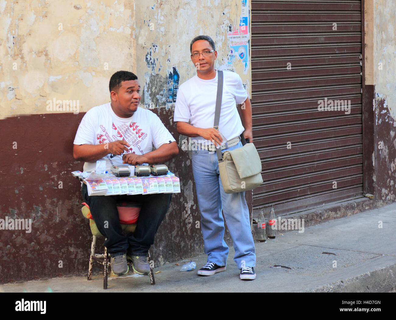 Republic Colombia, Departamento Bolivar, city Cartagena de Indias, street vendor, lottery seller Stock Photo