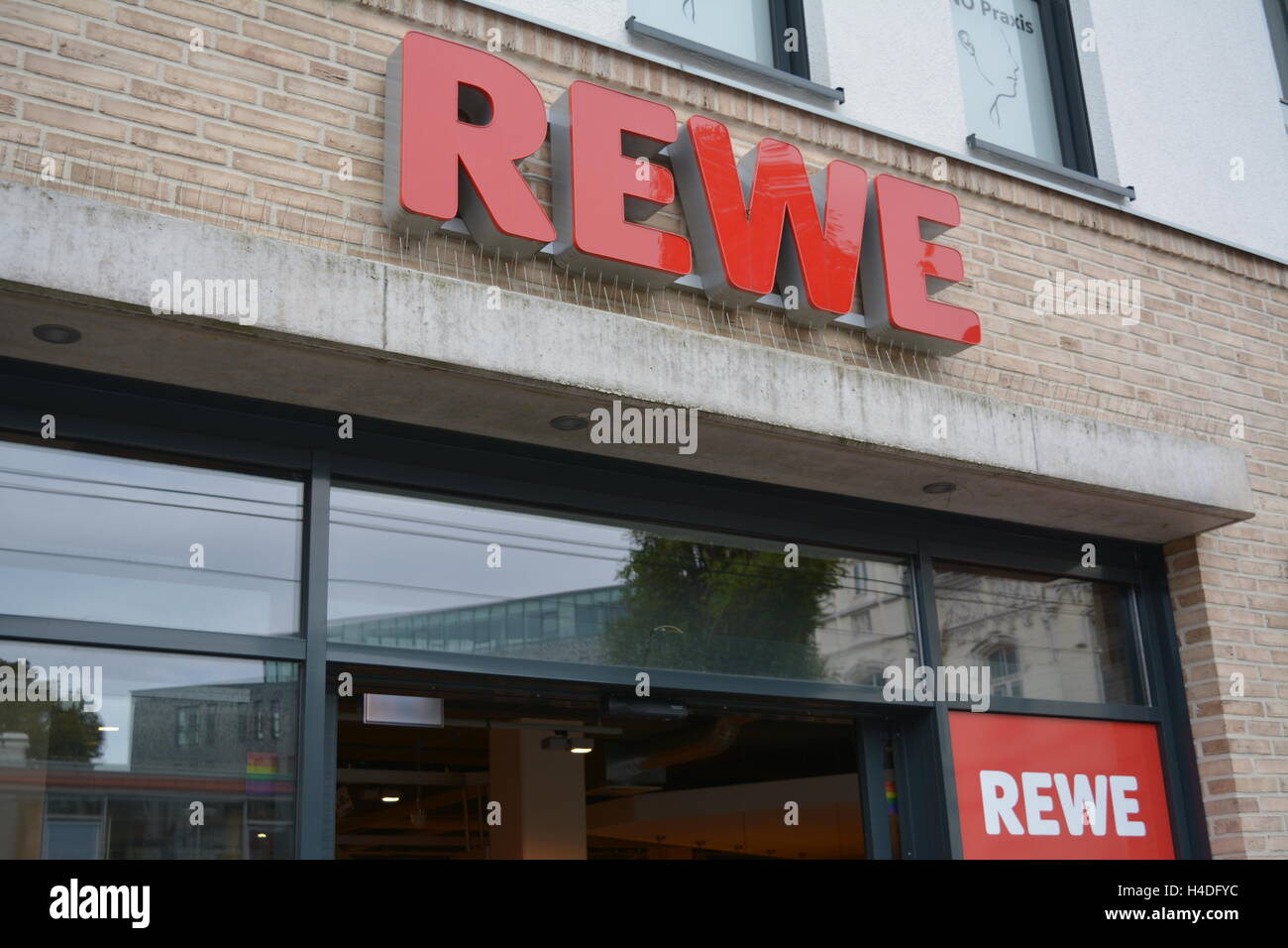 Logo of the REWE supermarket Stock Photo