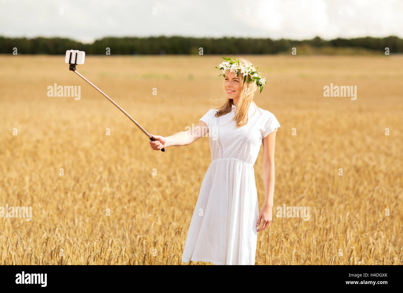 happy young woman taking selfie by smartphone Stock Photo - Alamy