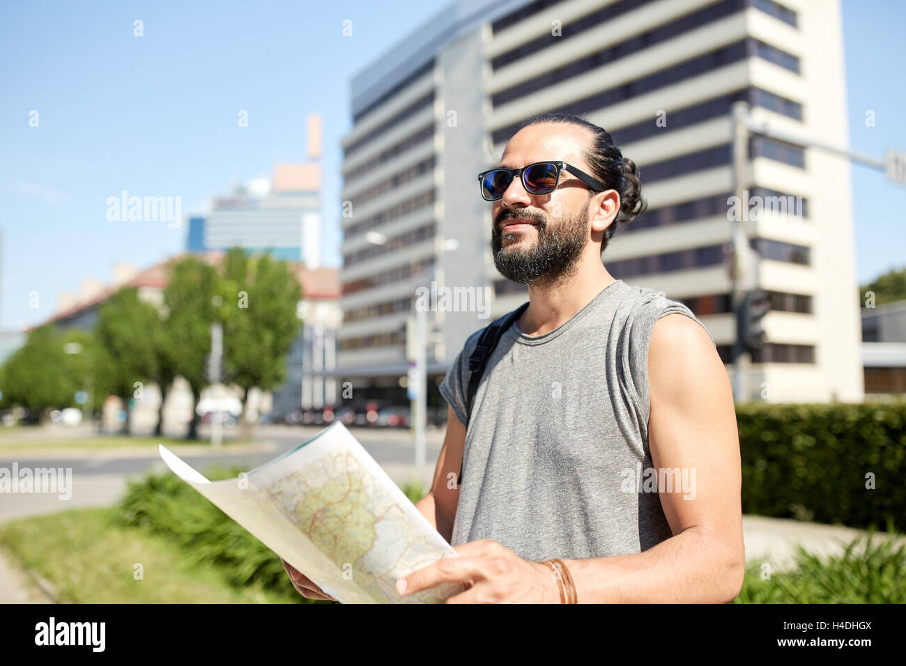 Male tourist map backpack in hi-res stock photography and images - Alamy