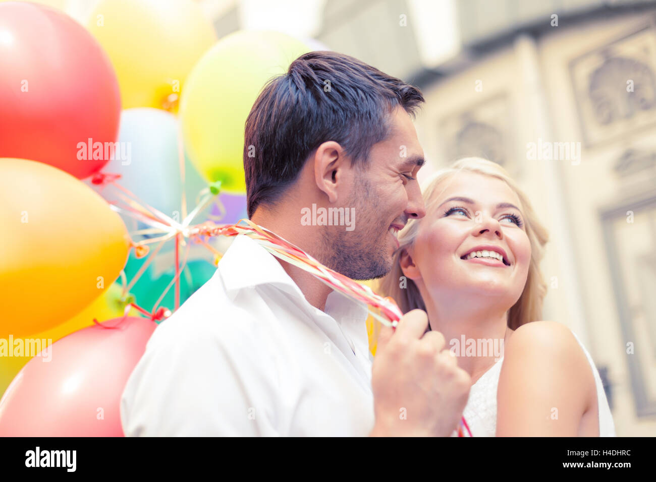 happy couple with colorful balloons Stock Photo