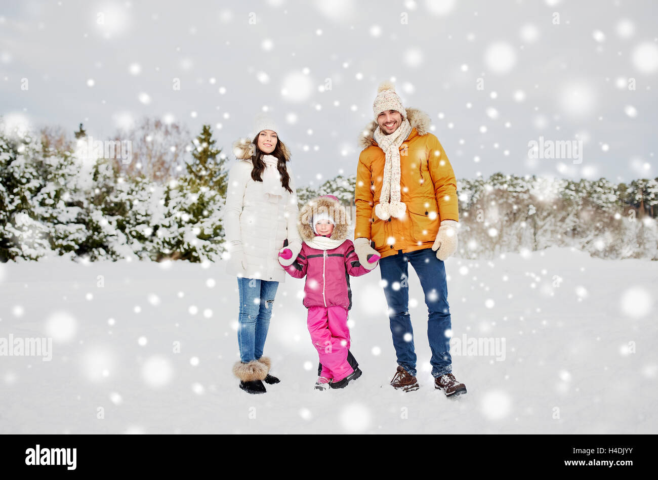 happy family with child in winter clothes outdoors Stock Photo - Alamy