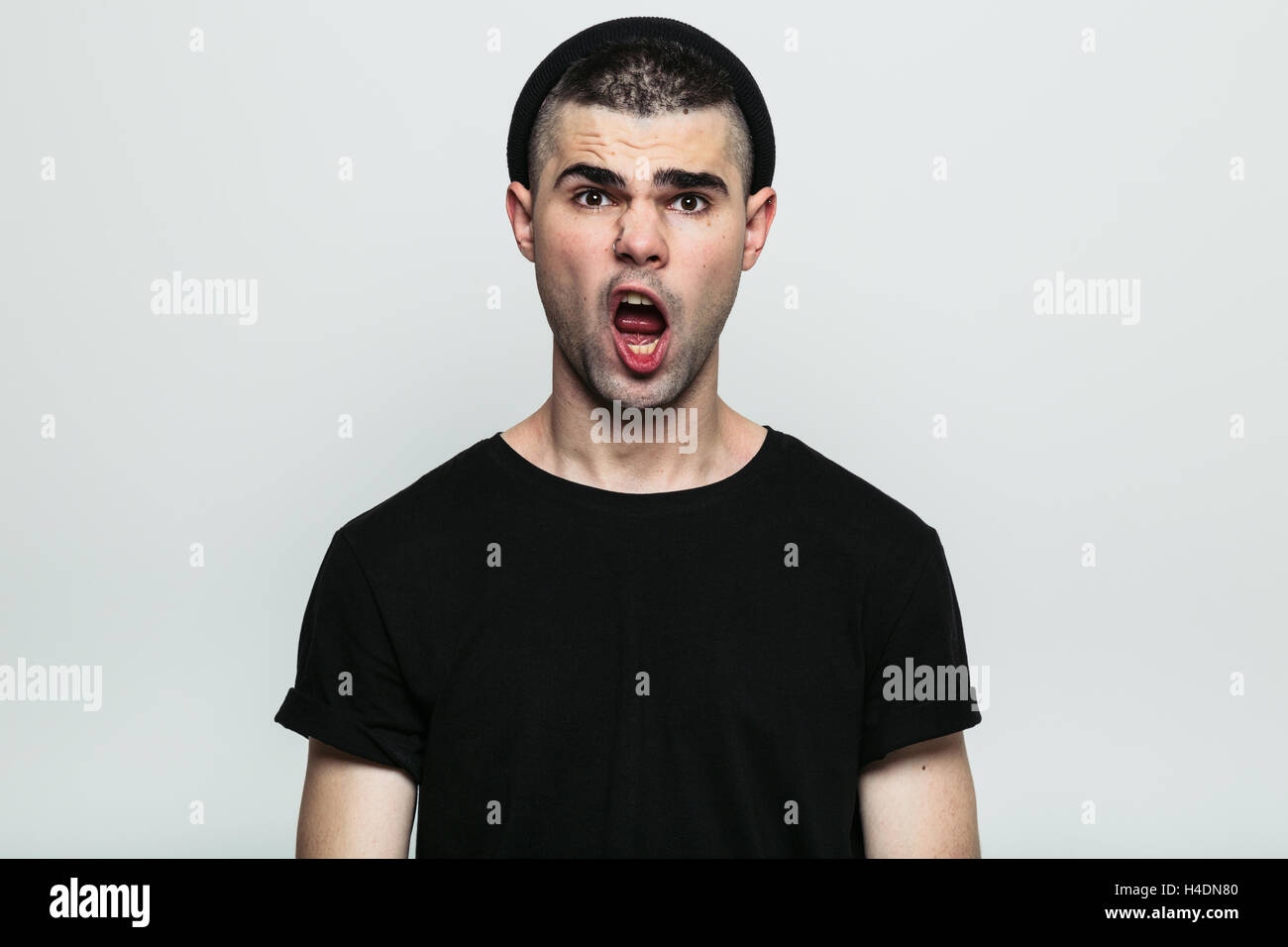 Man with an open mouth looking at camera Stock Photo