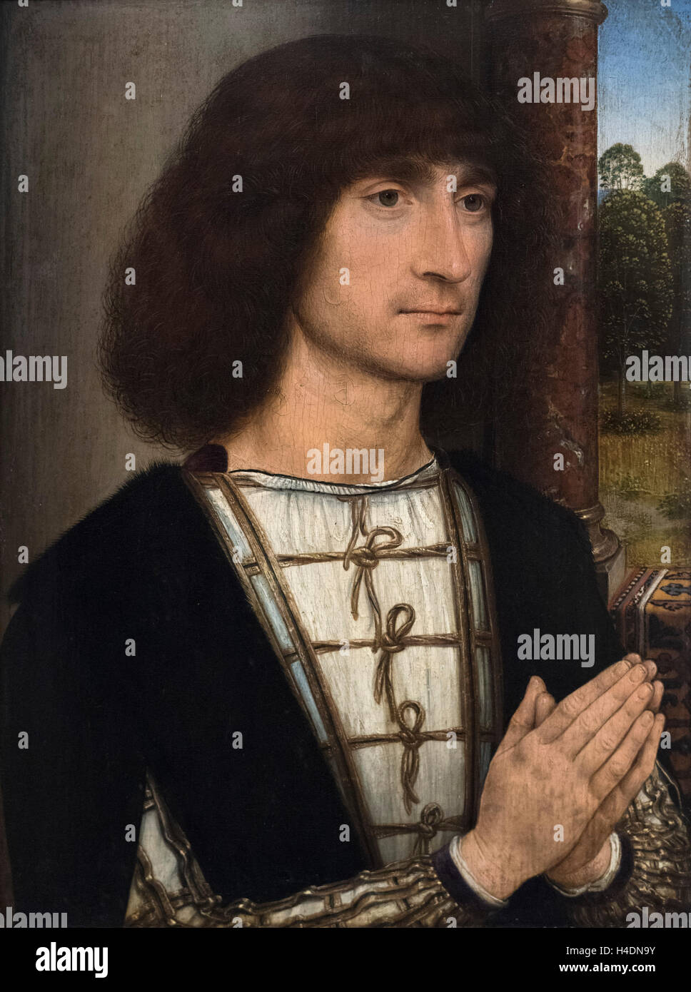 Hans Memling (ca. 1435-1494), Portrait of a Young Man at Prayer, ca. 1485. Stock Photo