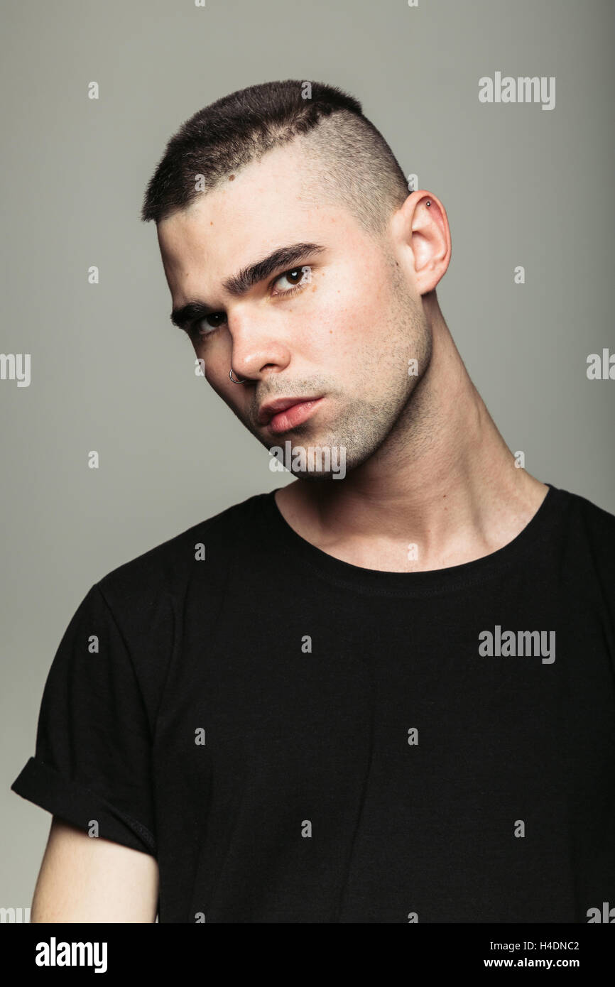 Close up studio shot of brutal guy Stock Photo - Alamy