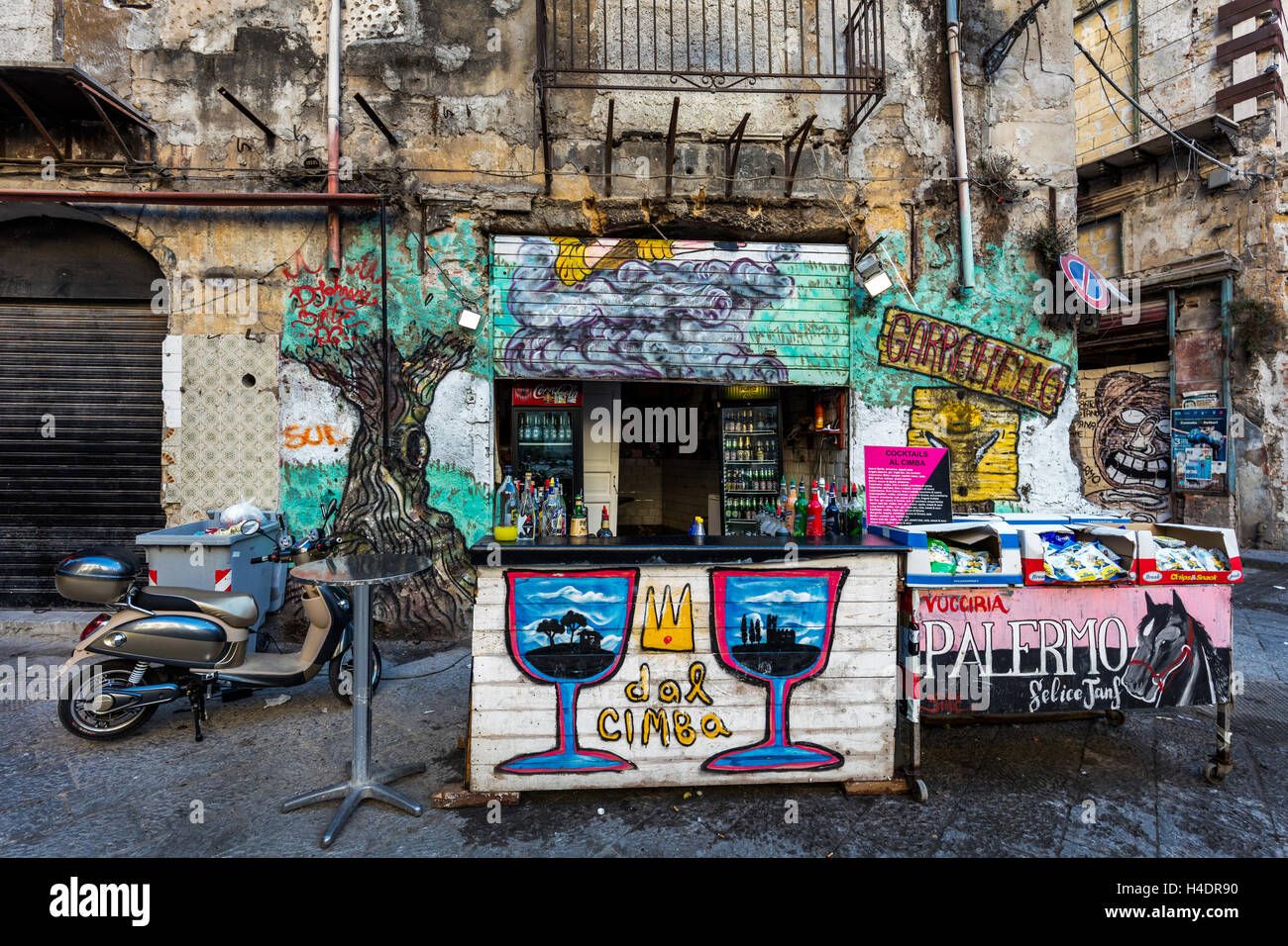 Street bar in the graffiti covered neighborhood of Palermo, Sicily. Stock Photo