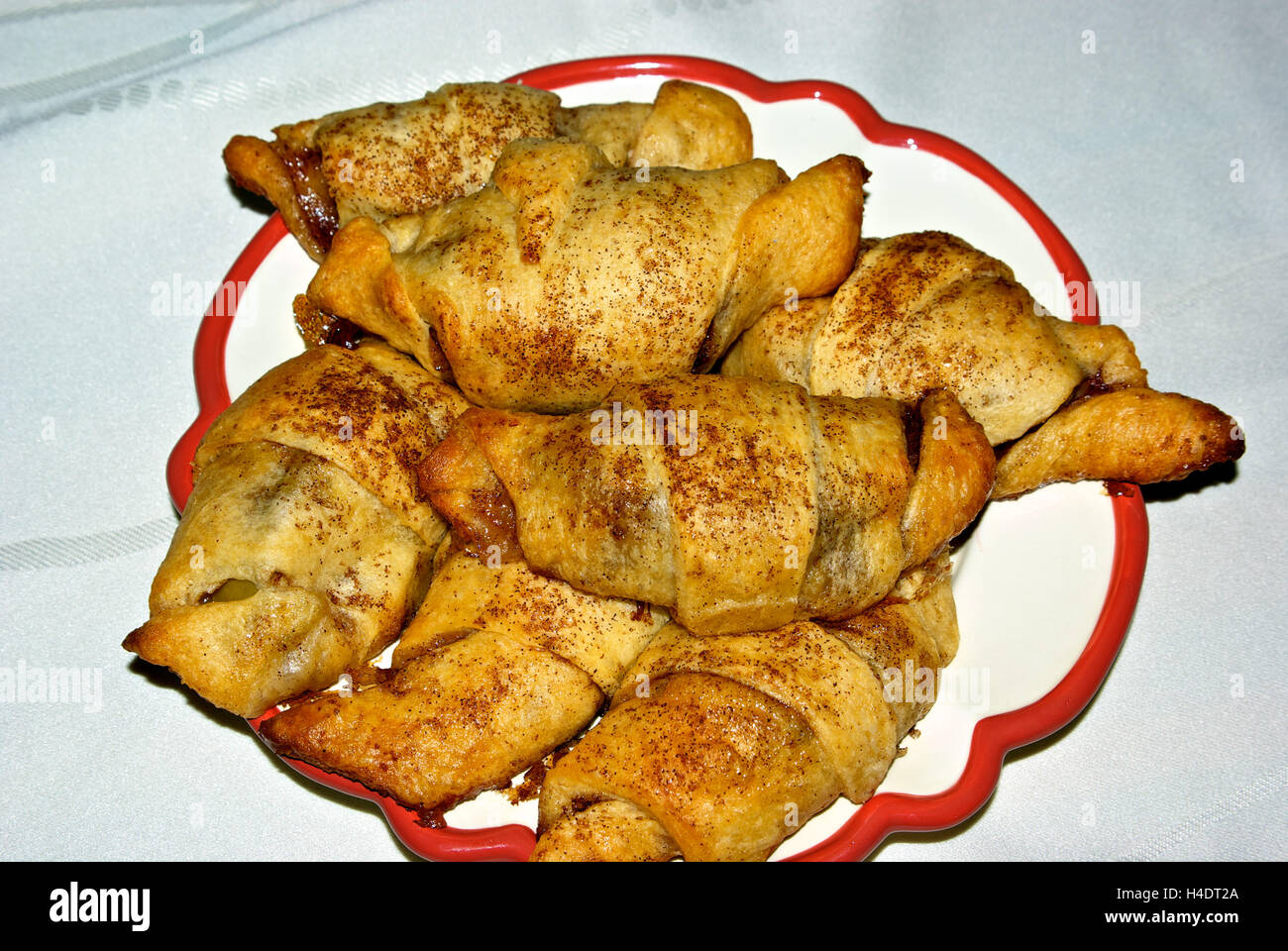 Cinnamon spice apple turnover pastries dessert plate Stock Photo