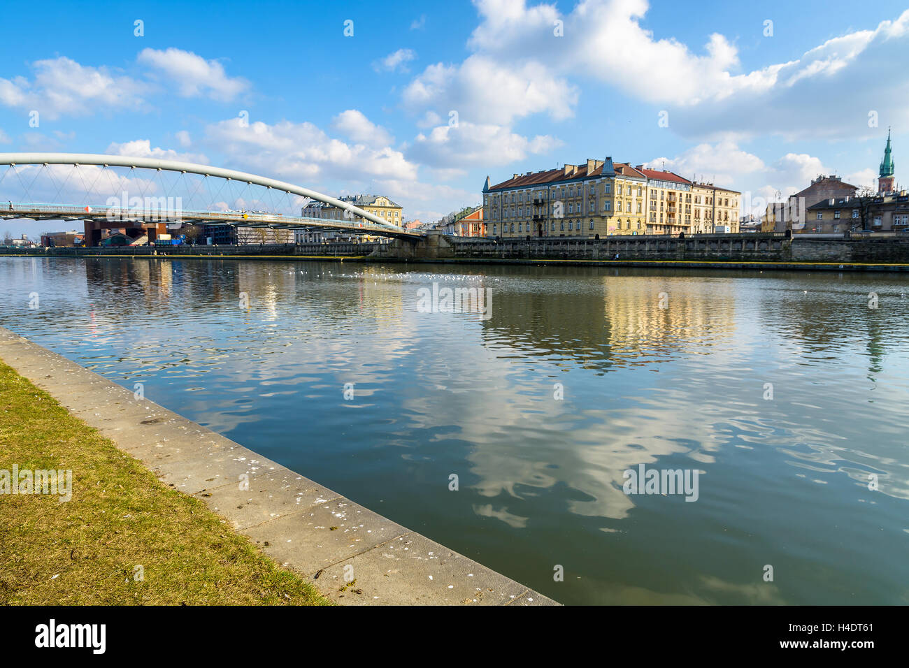 Steel bridge over Vistula river on sunny day, Krakow, Poland Stock Photo