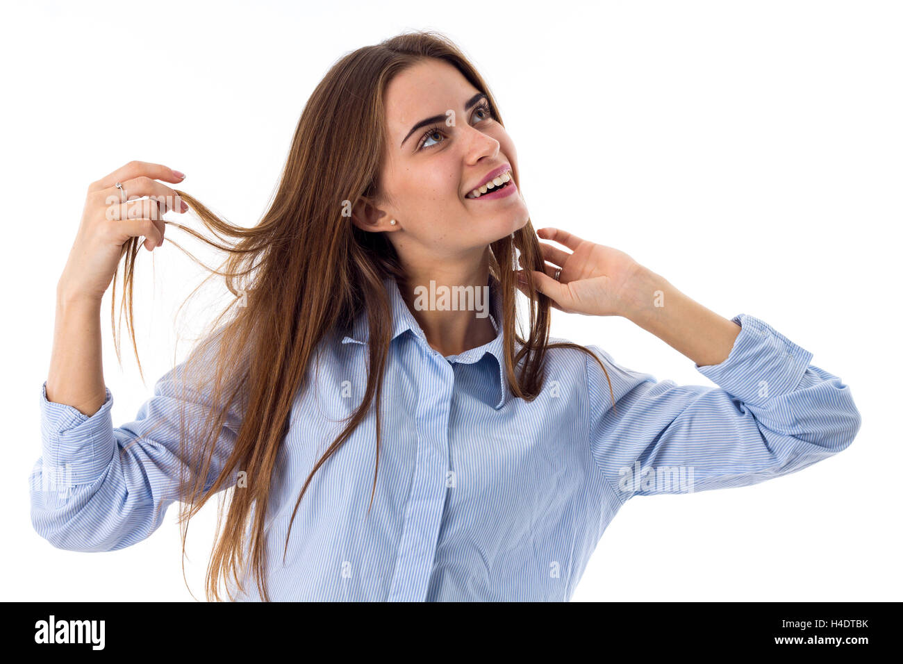 Woman touching her hair Stock Photo