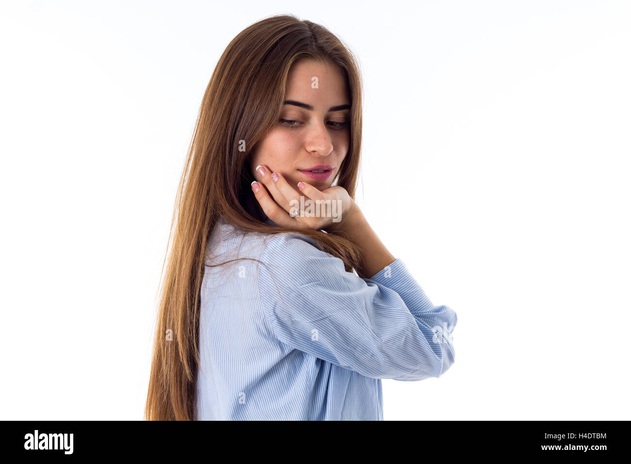Young woman looking down Stock Photo