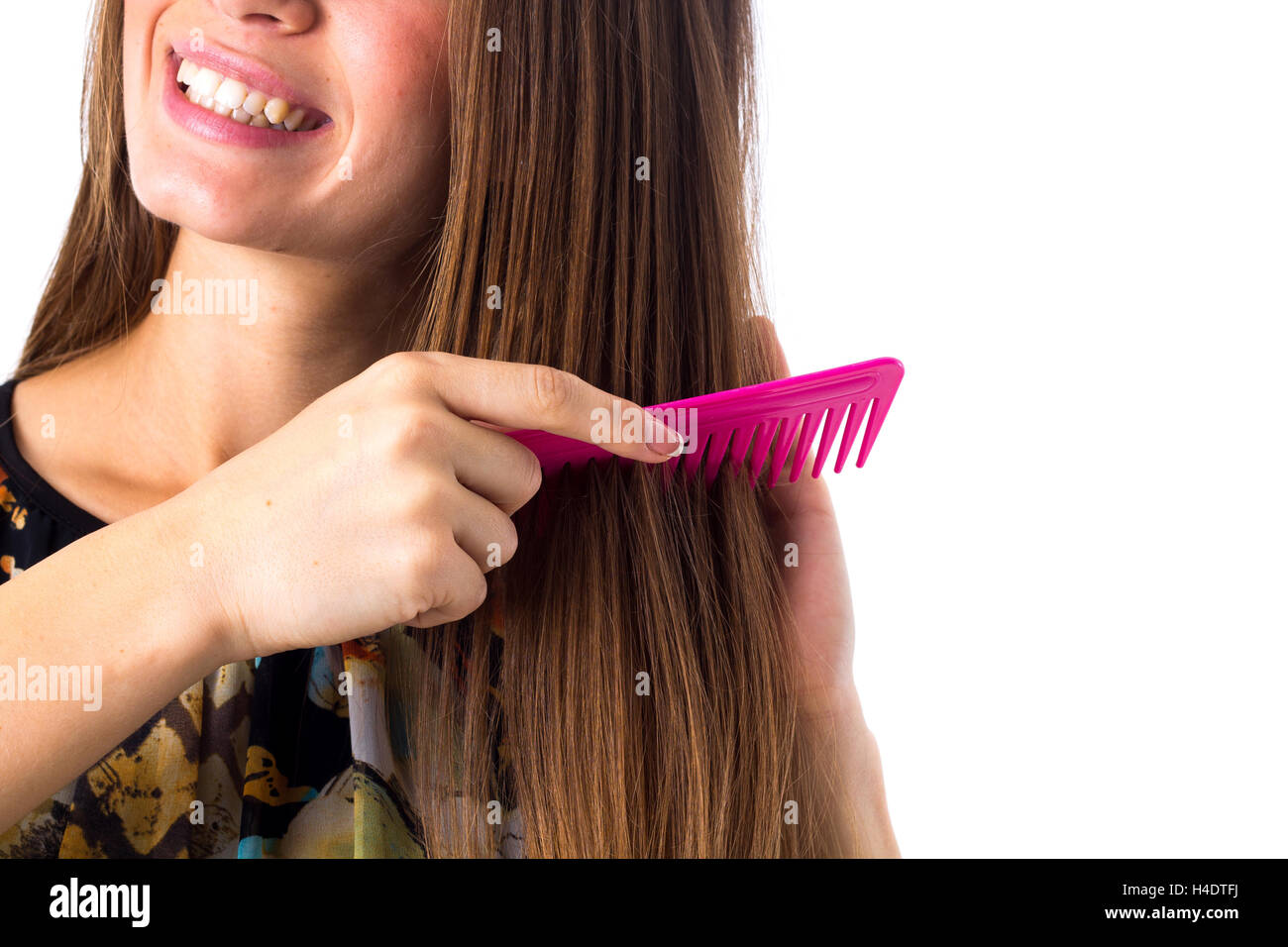 Young woman brushing her long hair Stock Photo Alamy