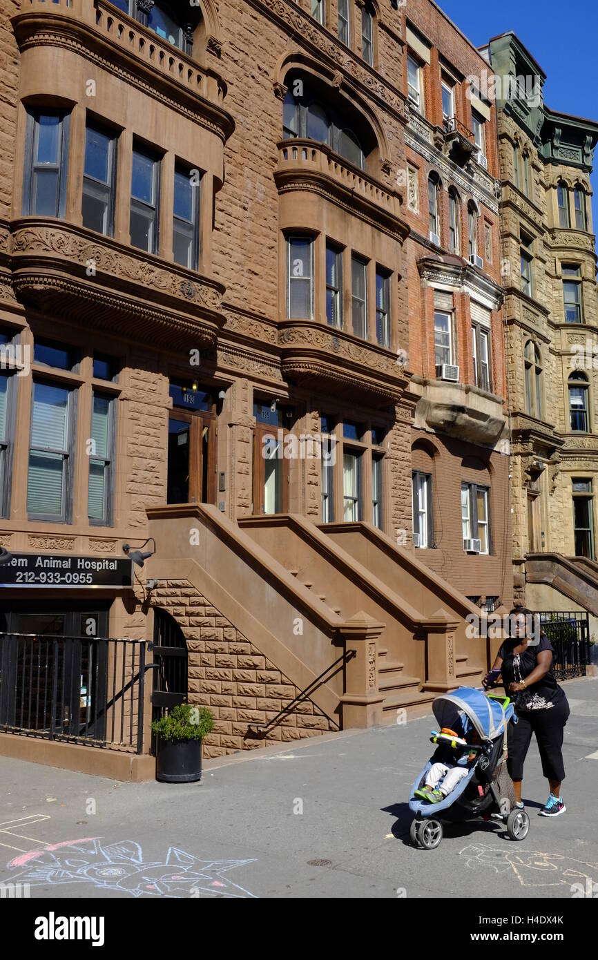 Renovated historic brownstone apartment building on Lenox Avenue aka