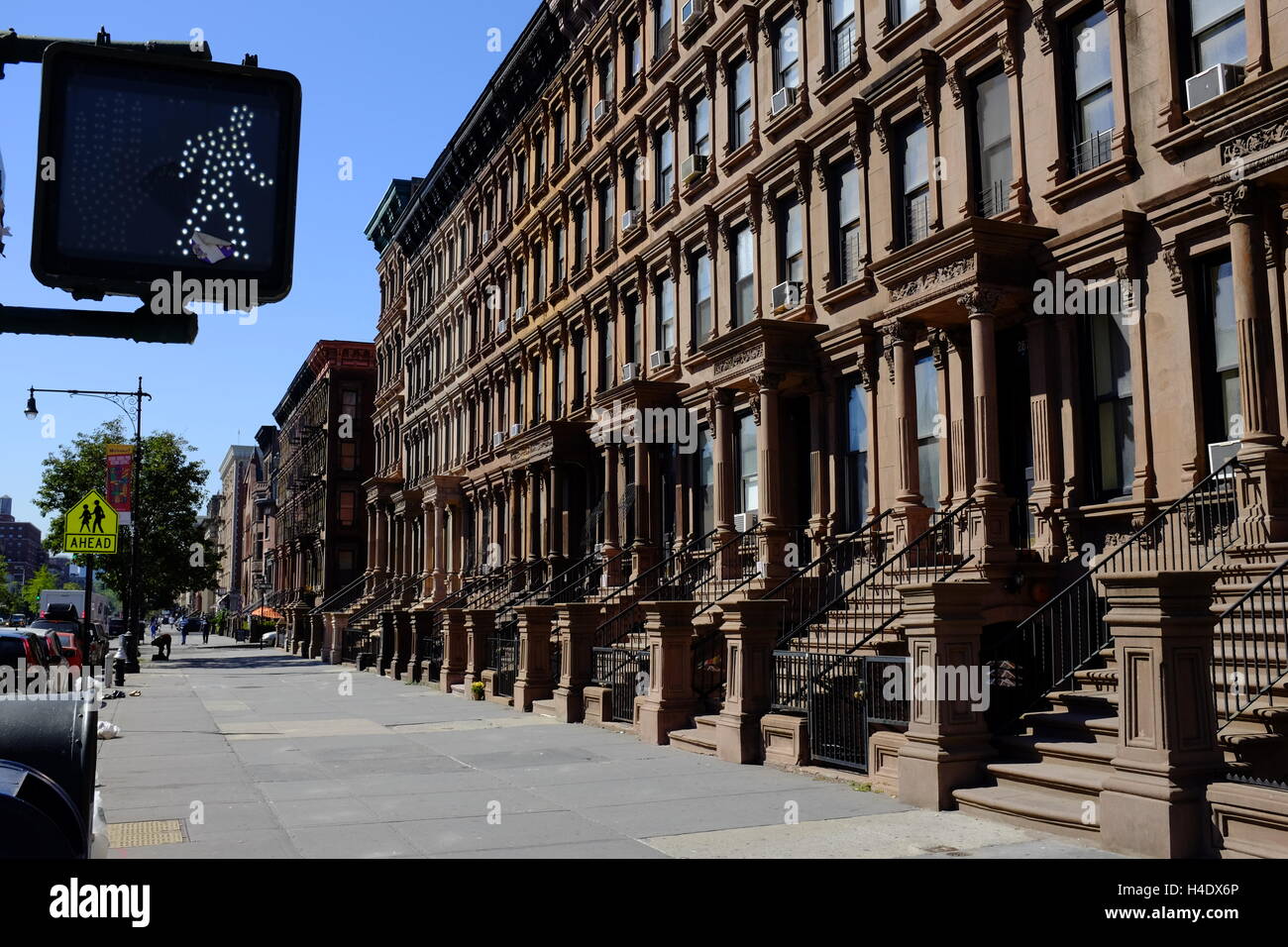 Renovated historic brownstone apartment building on Lenox Avenue aka
